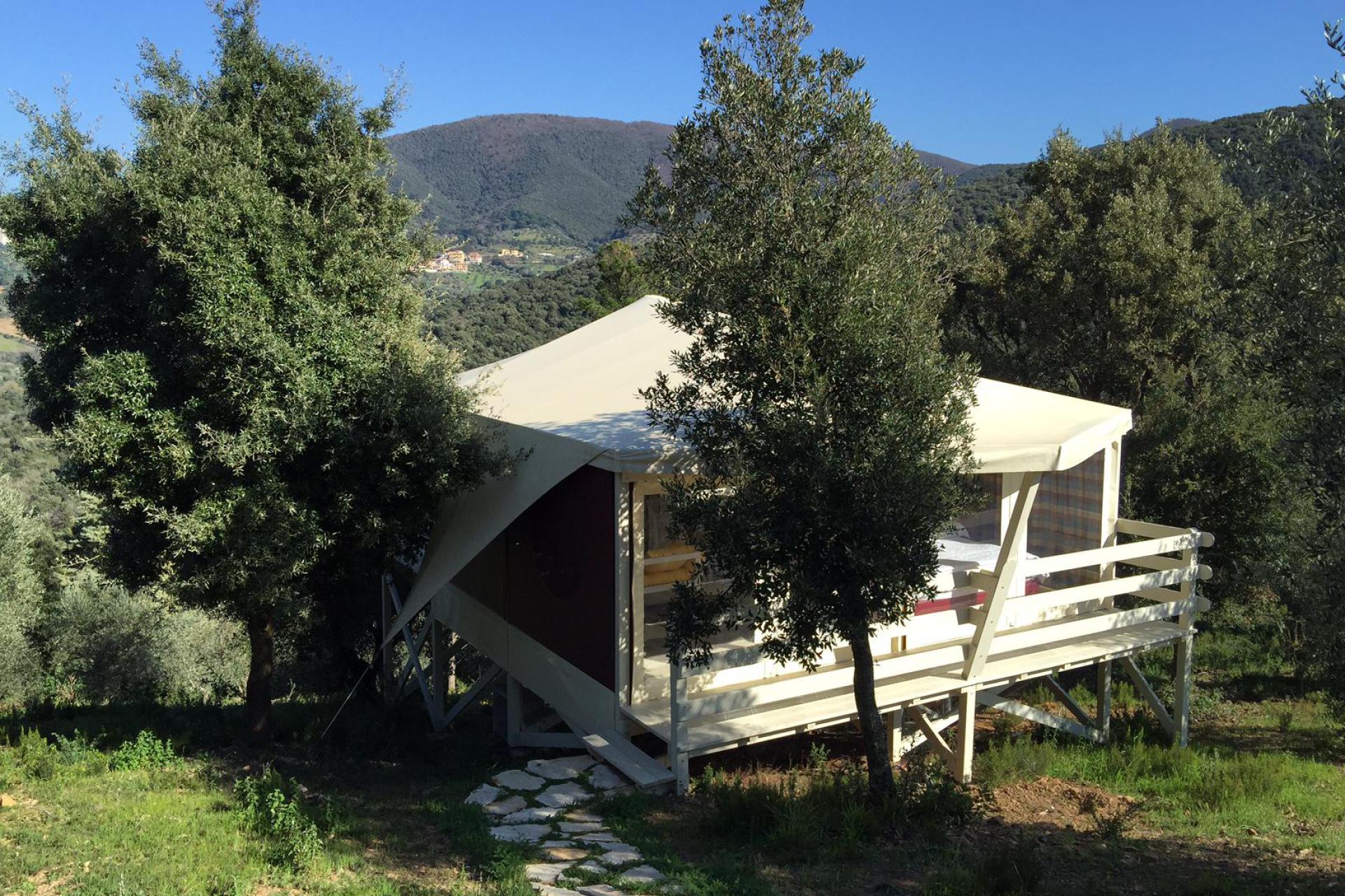 Luxury safari tents overlooking the sea or medieval castle