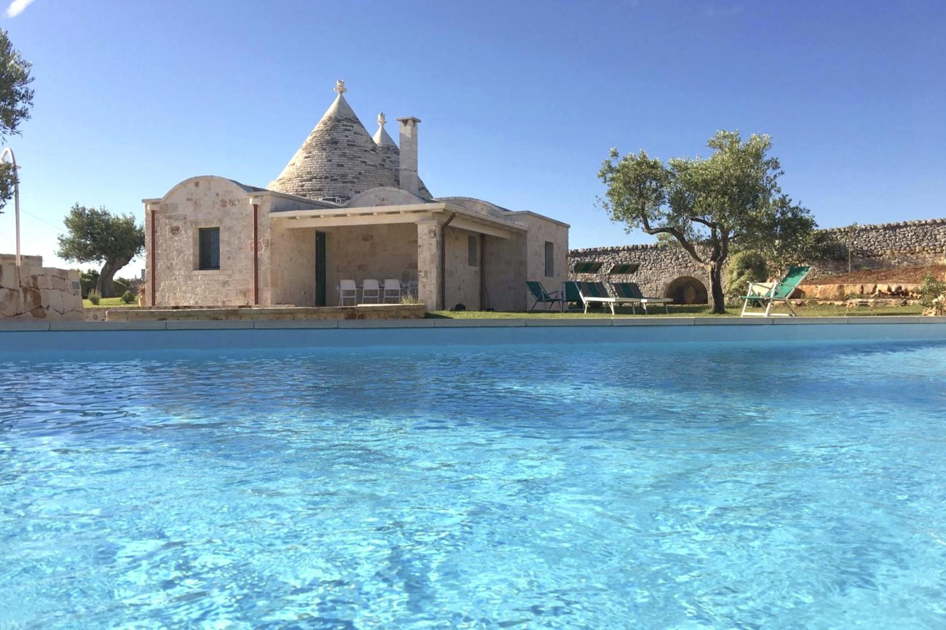 Private trullo with pool in olive orchard