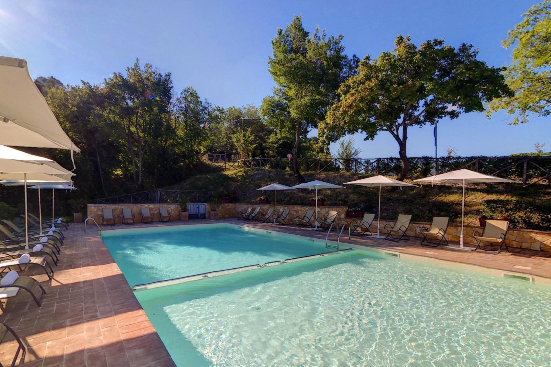Kleinschalig vakantiepark op een heuveltop in Umbrië
