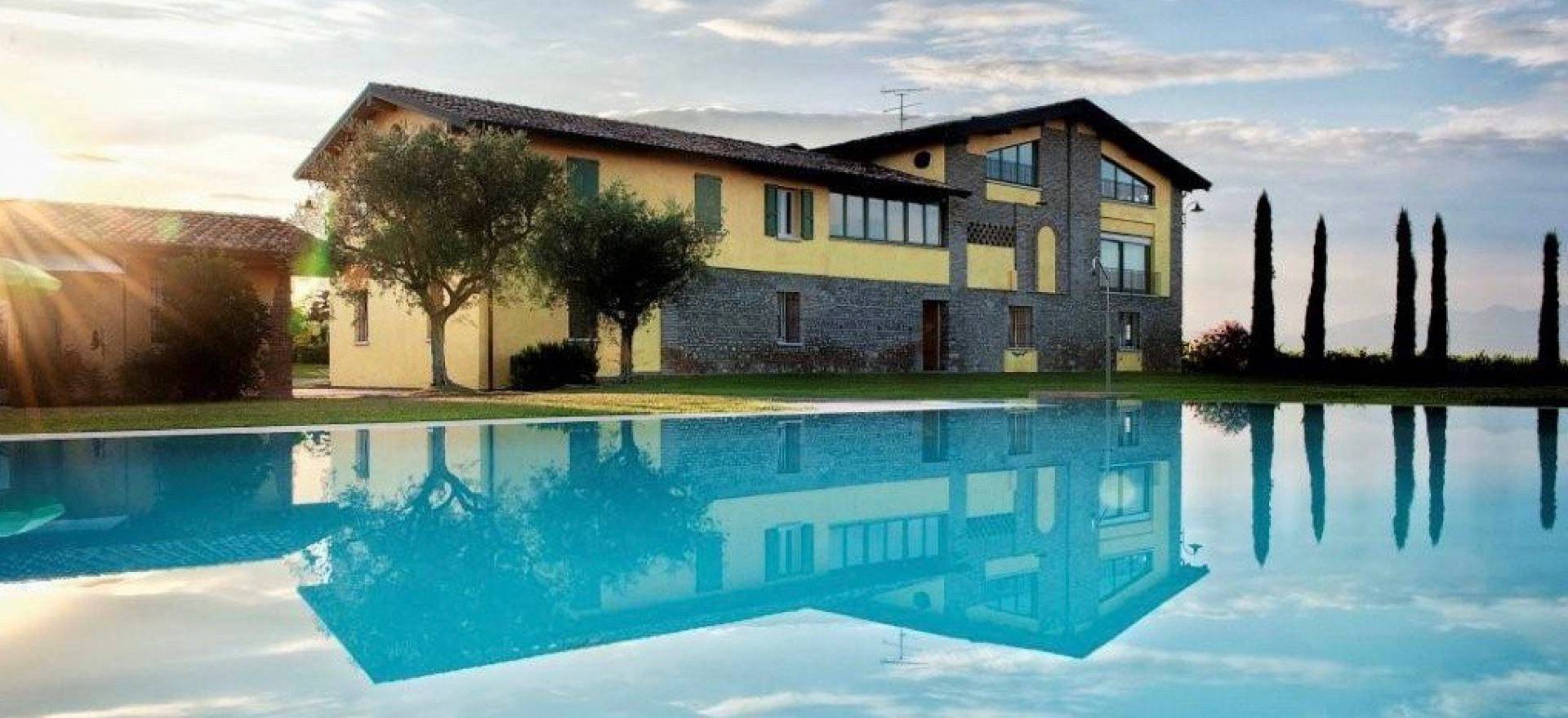 Agriturismo Lake Como and Lake Garda Agriturismo Lake Garda, surrounded by vineyards